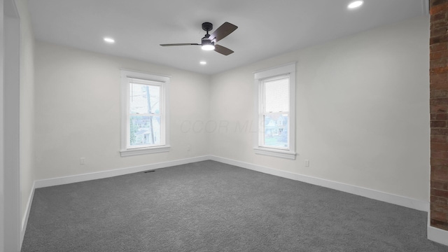732 Columbus Ave, Washington Court House, OH 43160 - spare room with a ceiling fan, dark carpet, and recessed lighting