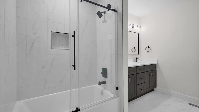 732 Columbus Ave, Washington Court House, OH 43160 - full bathroom featuring washtub / shower combination, marble look tiles, and vanity
