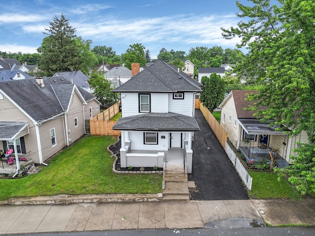 732 Columbus Ave, Washington Court House, OH 43160 - view of front of property with covered porch, a shingled roof, driveway, and a residential view