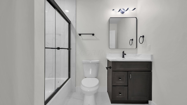 732 Columbus Ave, Washington Court House, OH 43160 - full bath featuring vanity, bath / shower combo with glass door, and marble finish flooring