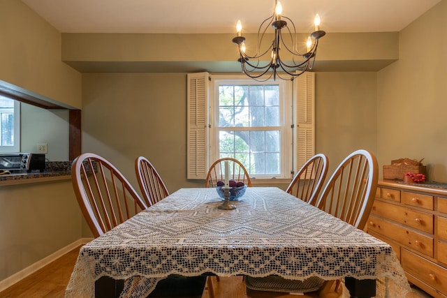 409 N High St, Lancaster, OH 43130 - dining area with a chandelier, plenty of natural light, and wood finished floors