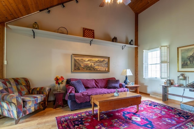 409 N High St, Lancaster, OH 43130 - living area featuring wood ceiling, a ceiling fan, light wood-type flooring, baseboard heating, and high vaulted ceiling