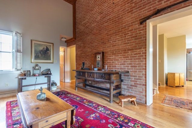 409 N High St, Lancaster, OH 43130 - living area featuring wood finished floors and a high ceiling