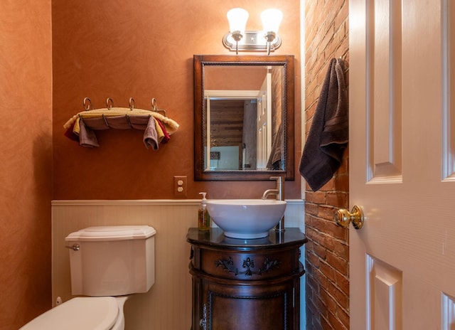409 N High St, Lancaster, OH 43130 - half bathroom with a wainscoted wall and vanity