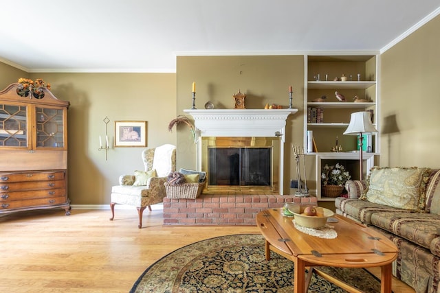 409 N High St, Lancaster, OH 43130 - living room with crown molding, wood finished floors, and a fireplace