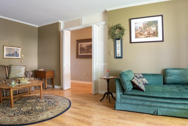 409 N High St, Lancaster, OH 43130 - living room featuring crown molding and light wood finished floors