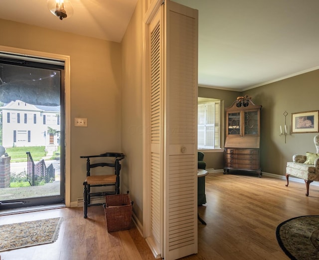 409 N High St, Lancaster, OH 43130 - foyer featuring wood finished floors and ornamental molding