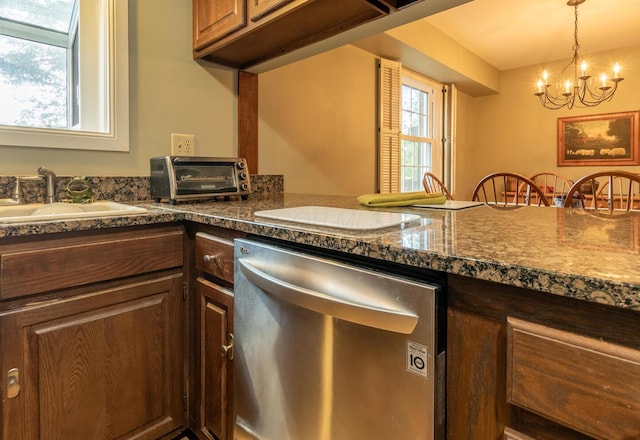 409 N High St, Lancaster, OH 43130 - kitchen with dishwasher, a chandelier, dark countertops, and decorative light fixtures