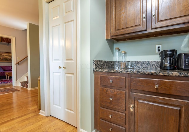 409 N High St, Lancaster, OH 43130 - bar with light wood-style flooring and stairs