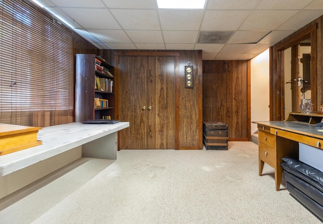 409 N High St, Lancaster, OH 43130 - office area with wooden walls, a paneled ceiling, and light colored carpet