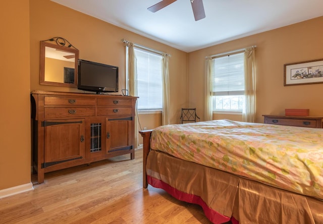409 N High St, Lancaster, OH 43130 - bedroom with light wood-style floors and ceiling fan