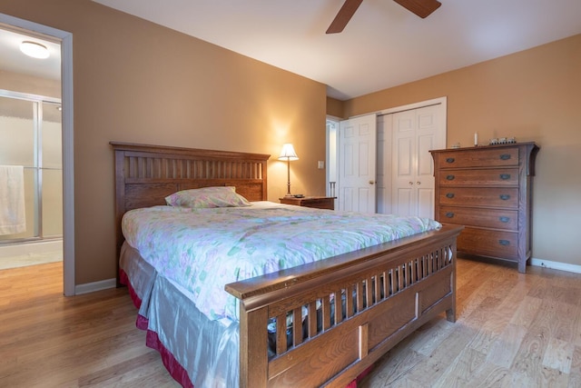 409 N High St, Lancaster, OH 43130 - bedroom featuring wood finished floors, a closet, and a ceiling fan