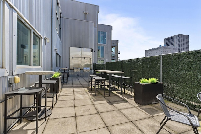 60 E Spring St Unit 220, Columbus, OH 43215 - view of patio featuring outdoor dining space