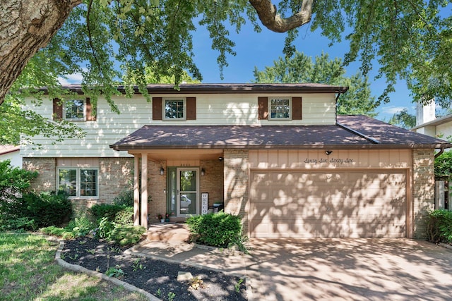 6666 Sharon Woods Blvd, Columbus, OH 43229 - traditional-style home with concrete driveway, brick siding, a garage, and roof with shingles