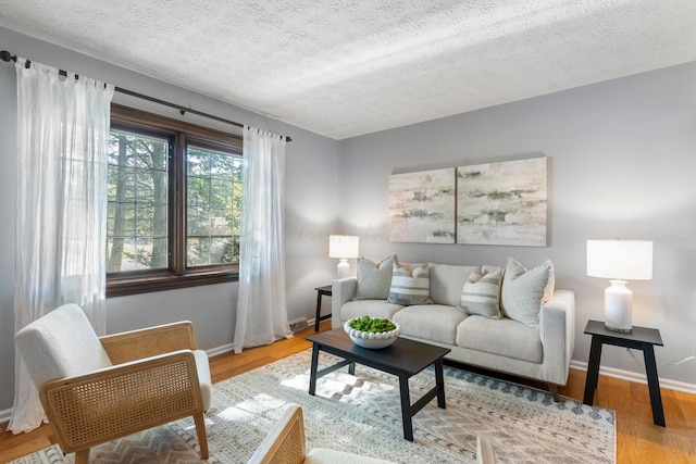 6666 Sharon Woods Blvd, Columbus, OH 43229 - living area with a textured ceiling and wood finished floors