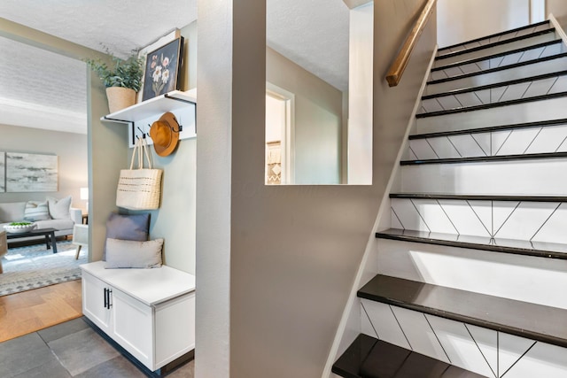 6666 Sharon Woods Blvd, Columbus, OH 43229 - staircase featuring a textured ceiling and tile patterned flooring
