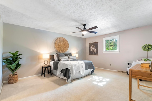 6666 Sharon Woods Blvd, Columbus, OH 43229 - bedroom featuring a textured ceiling, light carpet, and a ceiling fan