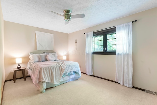 6666 Sharon Woods Blvd, Columbus, OH 43229 - bedroom with carpet flooring, a textured ceiling, and ceiling fan