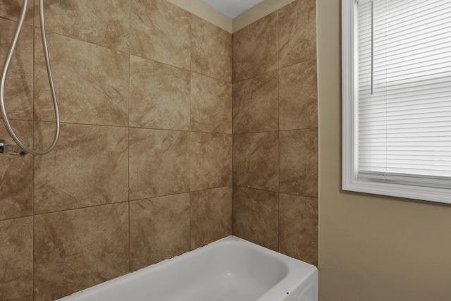 1077-1079 S James Rd, Columbus, OH 43227 - bathroom featuring a bathtub, a shower, and healthy amount of natural light