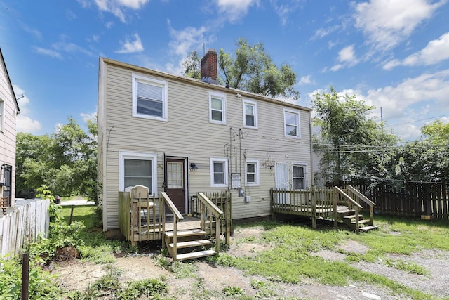 1077-1079 S James Rd, Columbus, OH 43227 - back of property with a deck and a chimney