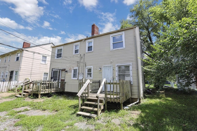 1077-1079 S James Rd, Columbus, OH 43227 - back of property featuring a chimney and a deck