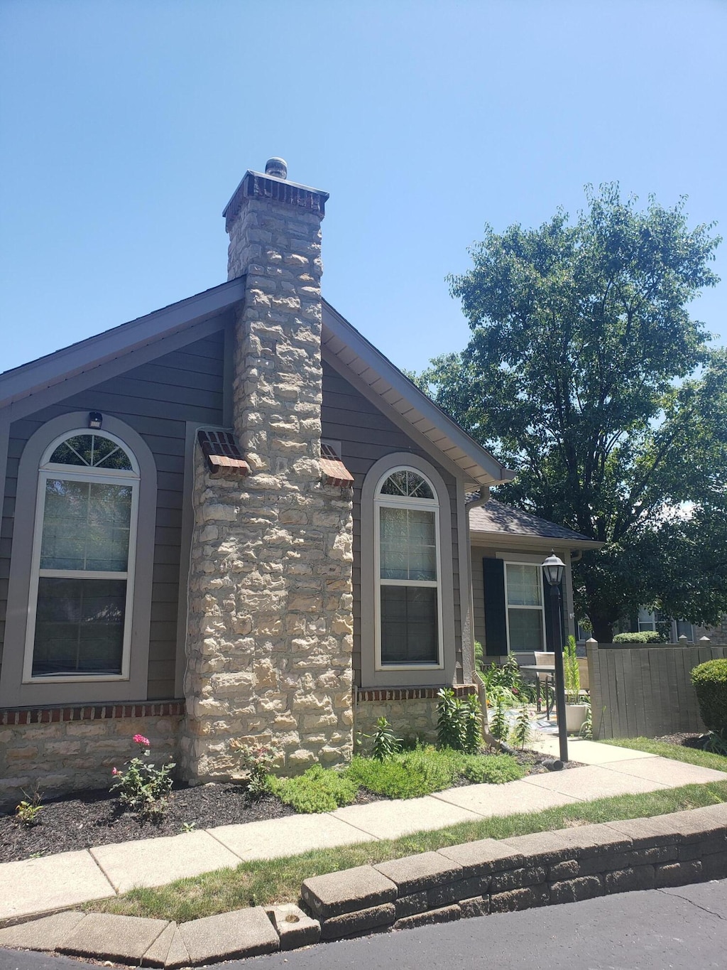 4185 Windsor Bridge Pl, New Albany, OH 43054 - view of home's exterior featuring a chimney