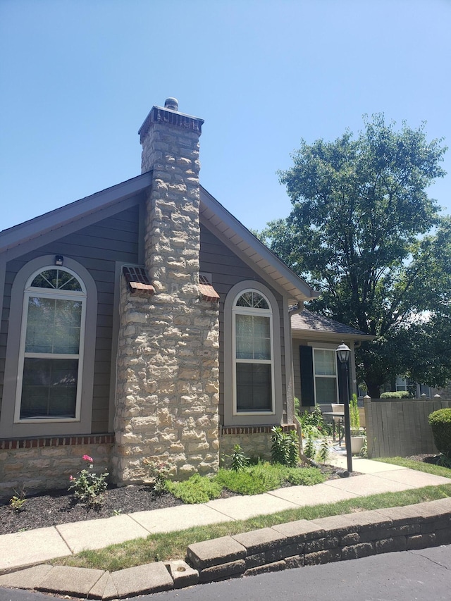4185 Windsor Bridge Pl, New Albany, OH 43054 - view of home's exterior featuring a chimney