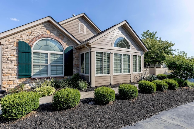 810 Lambton Cir W, Lancaster, OH 43130 - view of front facade featuring stone siding