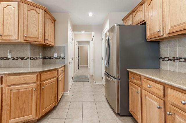 810 Lambton Cir W, Lancaster, OH 43130 - kitchen with freestanding refrigerator, light tile patterned floors, light countertops, decorative backsplash, and recessed lighting