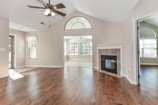 810 Lambton Cir W, Lancaster, OH 43130 - unfurnished living room with ceiling fan, vaulted ceiling, hardwood / wood-style flooring, and plenty of natural light