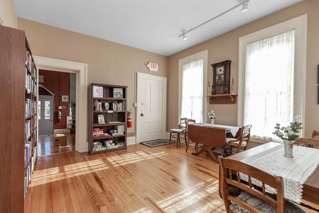 810 Lambton Cir W, Lancaster, OH 43130 - dining room featuring rail lighting and light wood-style flooring