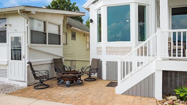 4721 W N Bank Rd, Buckeye Lake, OH 43008 - view of patio featuring an outdoor fire pit