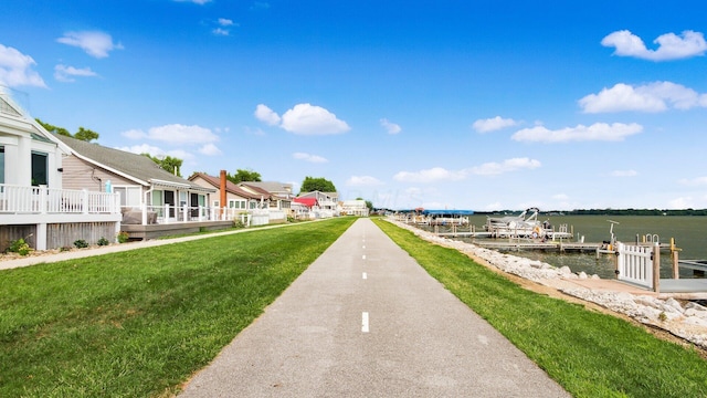 4721 W N Bank Rd, Buckeye Lake, OH 43008 - view of home's community with a water view, a boat dock, a yard, and a residential view