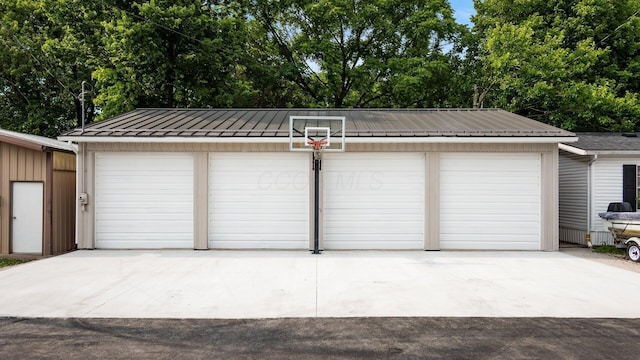 4721 W N Bank Rd, Buckeye Lake, OH 43008 - detached garage with view of wooded area