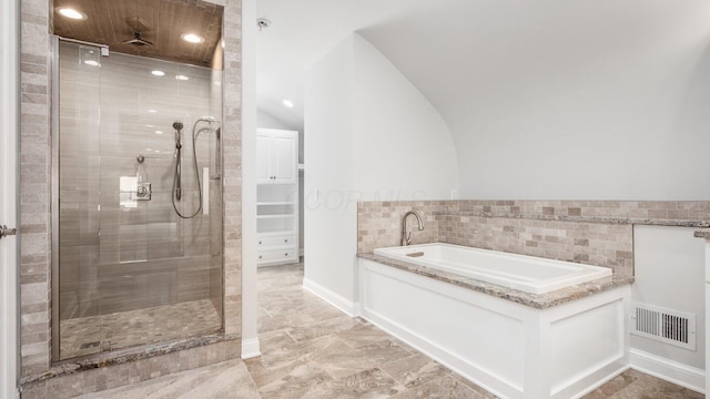 4721 W N Bank Rd, Buckeye Lake, OH 43008 - full bathroom with a garden tub, a shower stall, recessed lighting, and tile walls