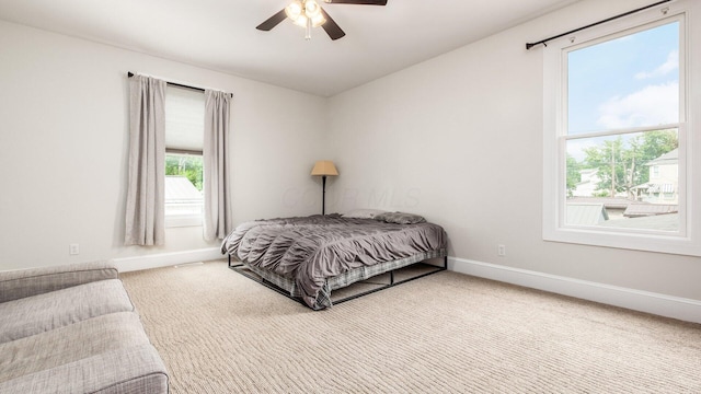4721 W N Bank Rd, Buckeye Lake, OH 43008 - carpeted bedroom with baseboards and ceiling fan