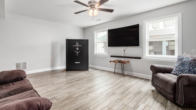 4721 W N Bank Rd, Buckeye Lake, OH 43008 - living area with light wood-type flooring and a ceiling fan