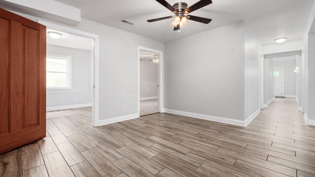 4721 W N Bank Rd, Buckeye Lake, OH 43008 - empty room featuring ceiling fan and light wood-type flooring