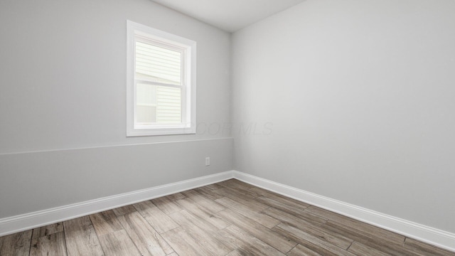 4721 W N Bank Rd, Buckeye Lake, OH 43008 - spare room featuring wood finished floors and baseboards