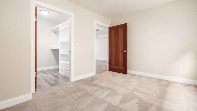 4721 W N Bank Rd, Buckeye Lake, OH 43008 - unfurnished bedroom with a spacious closet and carpet floors