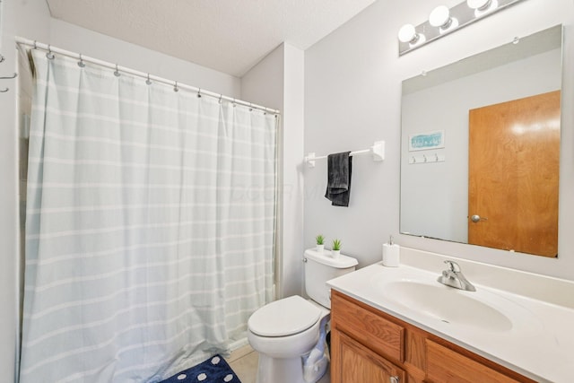 9375 Wingate Pl, Orient, OH 43146 - full bathroom with vanity, a textured ceiling, a shower with shower curtain, and tile patterned floors