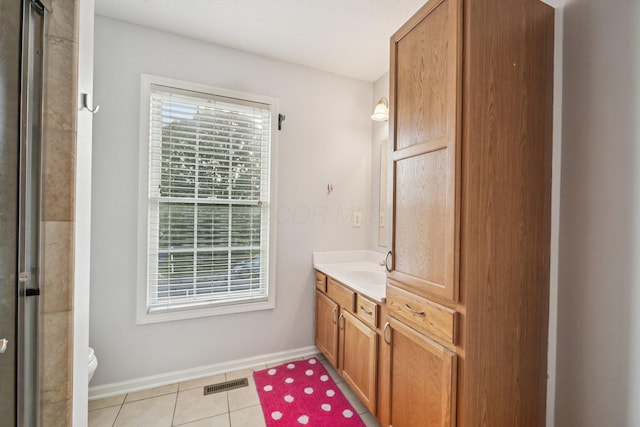 9375 Wingate Pl, Orient, OH 43146 - bathroom featuring vanity, tile patterned flooring, and a shower with shower door