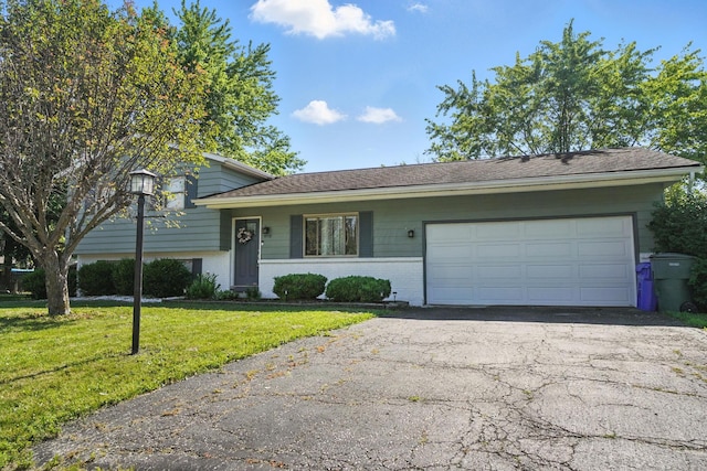 1978 Candlenut Cir, Grove City, OH 43123 - split level home with brick siding, driveway, a garage, and a front yard