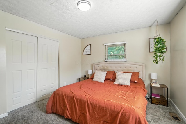 1978 Candlenut Cir, Grove City, OH 43123 - carpeted bedroom with a closet and a textured ceiling