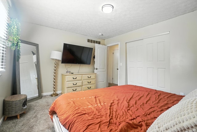 1978 Candlenut Cir, Grove City, OH 43123 - carpeted bedroom featuring a textured ceiling and a closet