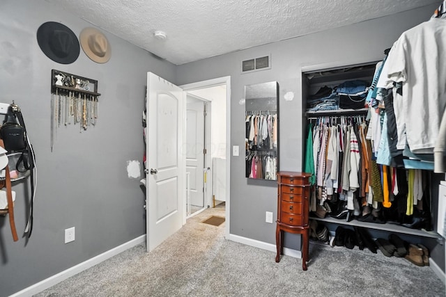 1978 Candlenut Cir, Grove City, OH 43123 - bedroom featuring carpet floors, a textured ceiling, and a closet