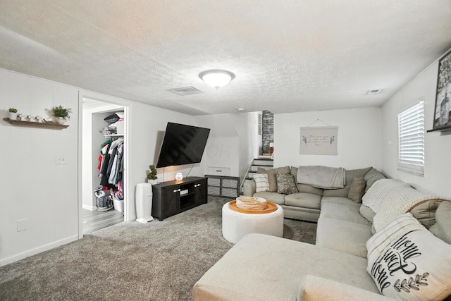1978 Candlenut Cir, Grove City, OH 43123 - carpeted living room featuring stairs and a textured ceiling