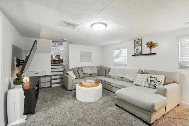 1978 Candlenut Cir, Grove City, OH 43123 - living room with stairway, carpet, and a textured ceiling