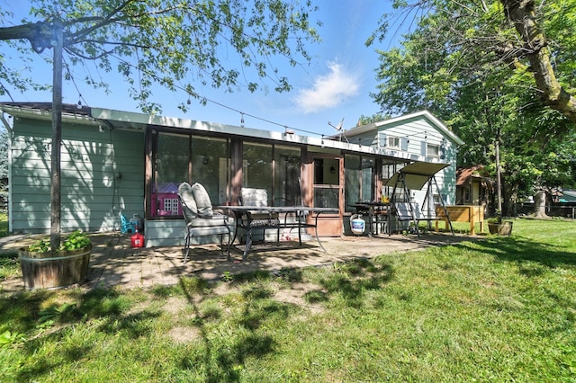 1978 Candlenut Cir, Grove City, OH 43123 - rear view of house with a patio area and a lawn