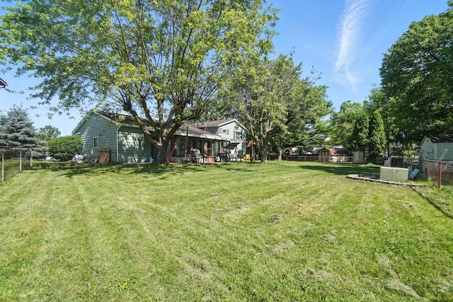 1978 Candlenut Cir, Grove City, OH 43123 - fenced backyard with a storage unit